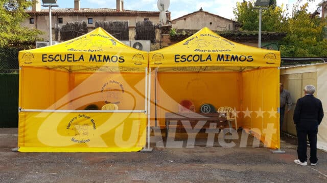 Tiendas plegables 3x3 de color amarillo con logos Escola Mimos